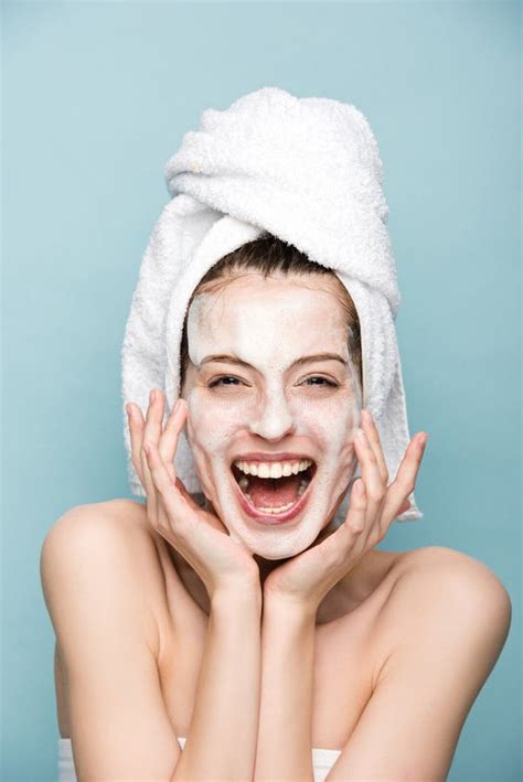 Girl With Moisturizing Facial Mask Laughing Stock Photo Image Of