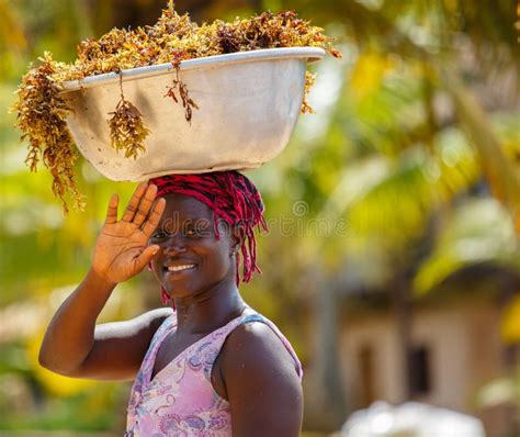 african woman carry things on her head editorial photo image of culture nature 41492546