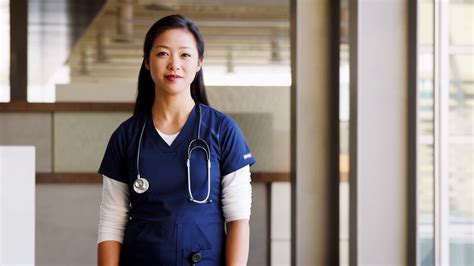 Dedicated Asian Doctor In Professional Attire Stock Footage Sbv 327980119 Storyblocks