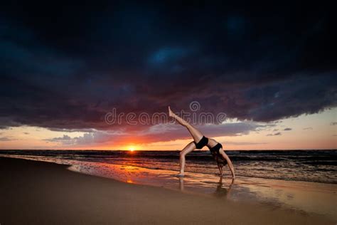 Beach Yoga Session By Polish Sea Stock Photo Image Of Beautiful Asana