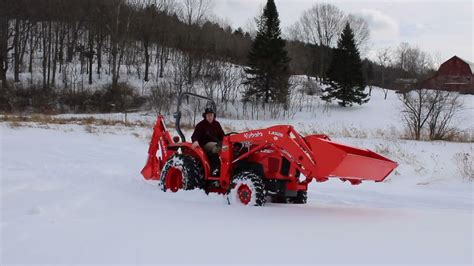 Brand New Kubota L2501 Bh77 La525 With R14 Tires Driving Through Deep