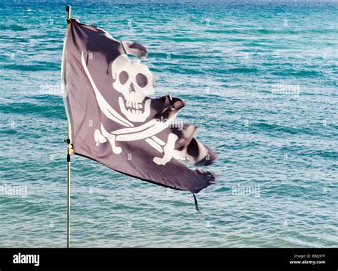 Tattered Pirate Flag Stock Photo Alamy
