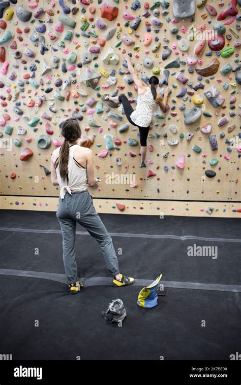 Female Climbers Climbing Session Wall In Climbing Gym Stock Photo Alamy