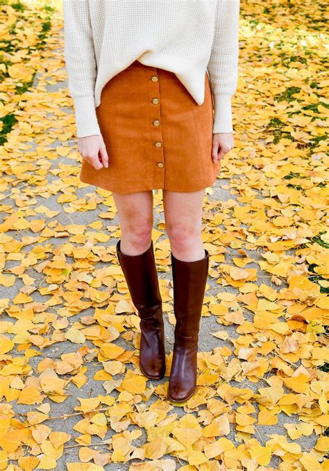 Fall Outfit With Ivory Sweater Camel Mini Skirt Brown Riding Boots