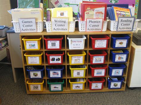Several Bins Are Stacked On Top Of Each Other In Front Of A Bookcase