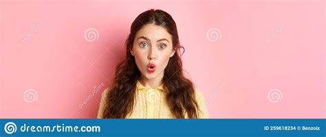 Close Up Portrait Of Surprised Brunette Girl Saying Wow Folding Lips