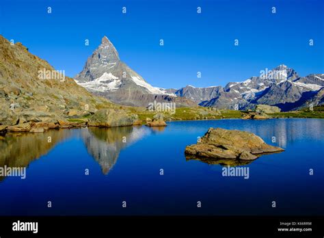 The East Face Of The Matterhorn Monte Cervino Mirroring In The Lake