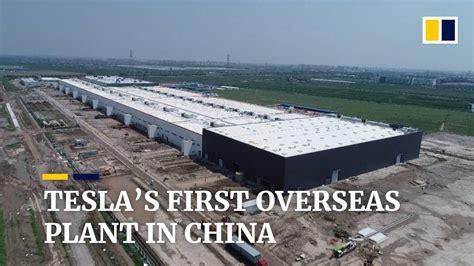 Teslas First Overseas Car Plant Nears Completion In Shanghai Youtube