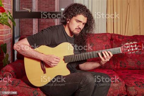 Bogota Colombia A Young Long Haired Latin American Guitarist Of Mixed
