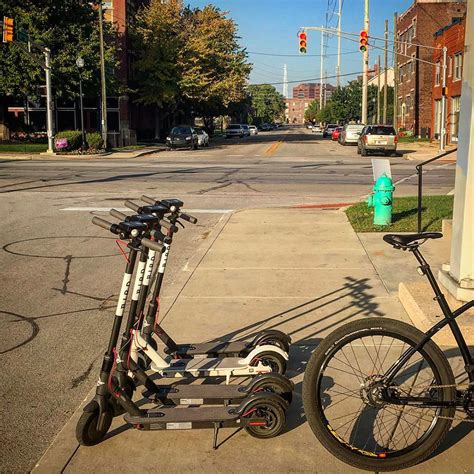 Scooters Blocking Wheelchair Access To Sidewalks