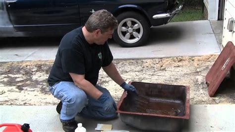 Throw the acid out into a waiting bucket, but make sure that acid won't damage it. Episode 87 How to restore your car's gas tank using POR15 ...