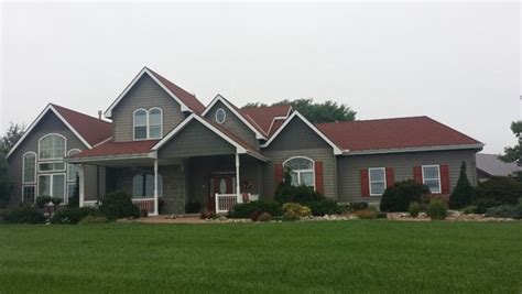 The red roof will make the house look outstanding. Red Roof. Need paint colors for house paint and trim. On Acreage. Wan