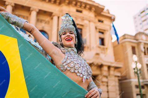 premium photo beautiful brazilian woman wearing colorful carnival costume and brazil flag