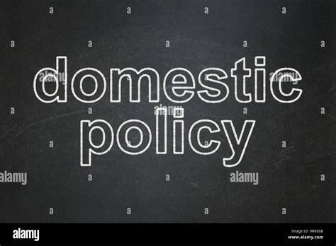 Politics Concept Domestic Policy On Chalkboard Background Stock Photo
