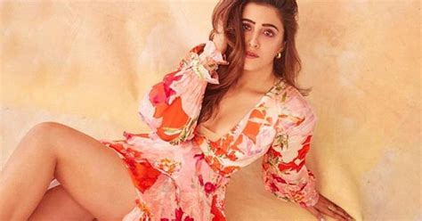 Pop Kaun Actress Nupur Sanon Flaunts Her Sexy Legs In This Cleavage Baring Flower Printed