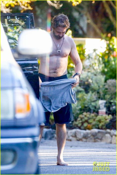 Gerard Butler Strips Off His Shirt After Surfing Session Photo