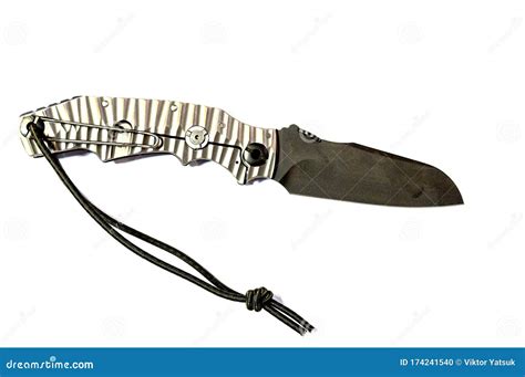 A Knife With A Silver Handle And A Black Blade Knife On A White