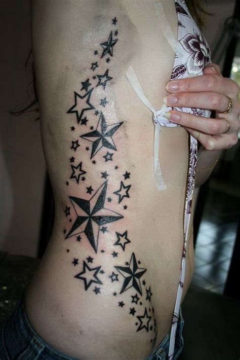 Lets Paint Your Body With Stars Star Tattoo On Women On Side Tattoo Design Inspiration