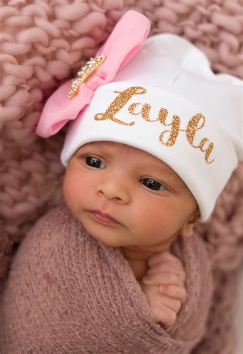 Sweet Layla Wearing A Personalized Hat For Her Newborn Session