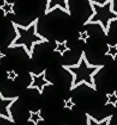 Black And White Stars Are Arranged In The Shape Of Small Dots On A Dark