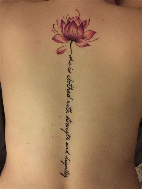 lotus flower spine tattoo