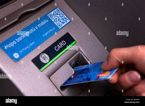 Insert Credit Card Into An Atm Machine Stock Photo Alamy