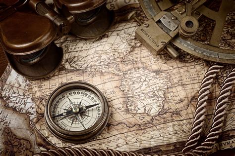 Golden Compass Rose On A World Map Background And Retro Transport My