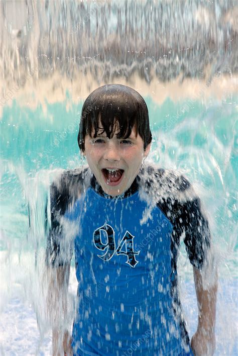 Boy Getting Soaked In Summertime Stock Image P9300822 Science