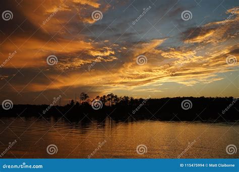 Sunset Over Marshy Low Country On The Water Stock Photo Image Of