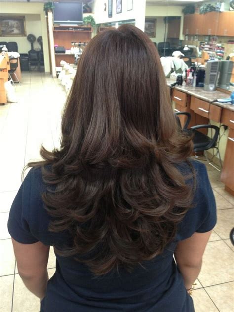 You will have long hair with layers on the back, side, and front. Pin on long round layers