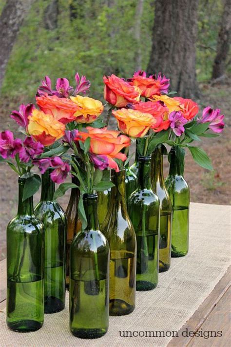 15 Inspired Ways To Decorate With Empty Wine Bottles Wine Bottle Centerpieces Wedding