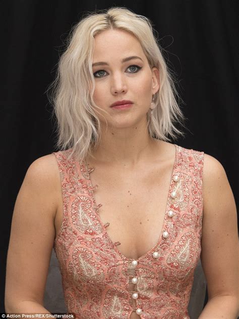 Jennifer Lawrence Flashes Her Cleavage And Toned Waist In Plunging Crop