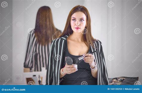 Amazing Young Woman Doing Her Makeup In Front Of Mirror Portra Stock