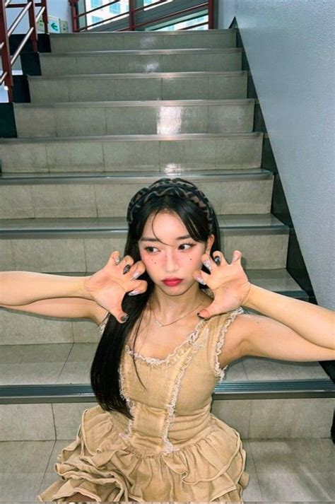 A Photo Of Stayc Bae Sumin On Stairs With A Cute Dress Outfit Aesthetic Nails Hot Blackhair