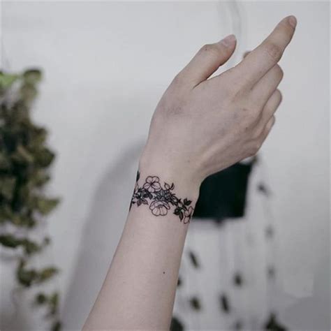 50 Meaningful Wrist Bracelet Floral Tattoo Designs You Would Love To