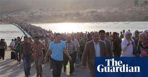 Thousands Of Syrian Refugees Pour Into Iraq Syria The Guardian