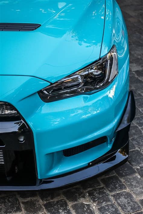 Close Up Headlight Of A Blue Sports Car Modern Car Lighting Equipment