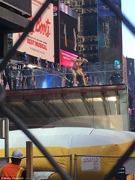 Naked Model Launches Donald Trump Protest In Times Square Before Jumping Off 16ft Ledge Daily