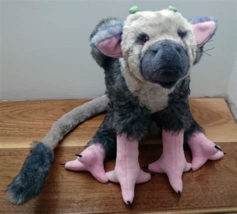 It looks like a combination of a dog, bird, and a cat. The Last Guardian - Trico plush - Owl's Tea Party