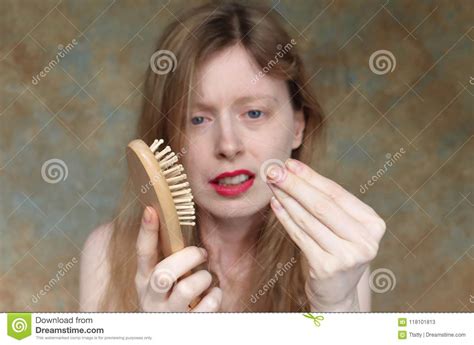 Using too much shampoo, brushing or combing your hair when it's wet, rubbing hair dry with a towel,. Upset About Hair Falling Out Stock Image - Image of ...