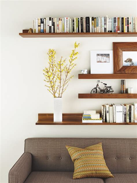 Application in all kinds of interiors according to taste and need. Modern Living Room With Wall-Mounted Shelves | HGTV