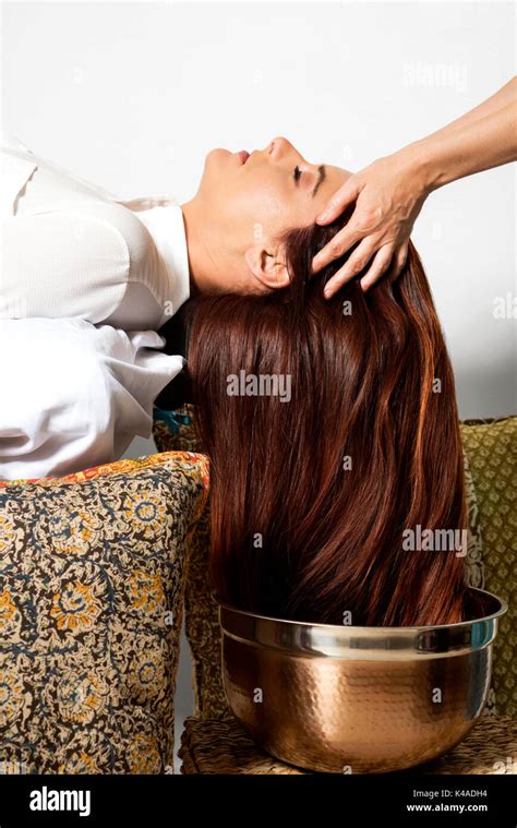 luxurious hair oil treatment massage beauty woman with luxurious long hair having had a hair
