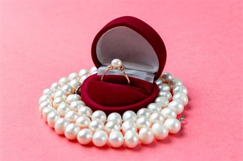 Premium Photo Pearl Ring In Heart Shaped Box And Necklace Valentine