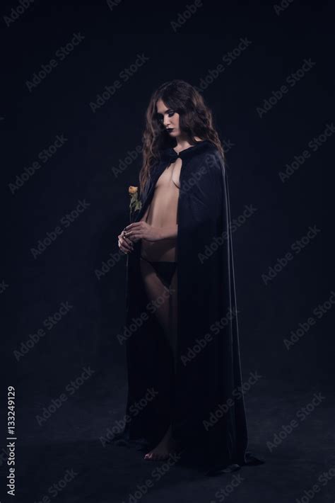 Beautiful Naked Gothic Girl In A Black Cloak Stock Photo Adobe Stock