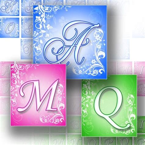 Three Different Colored Tiles With The Letter Q In Its Uppercase And
