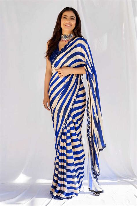 Beauteous Kajol In Blue And White Striped Saree With Heavy Sequence Blouse