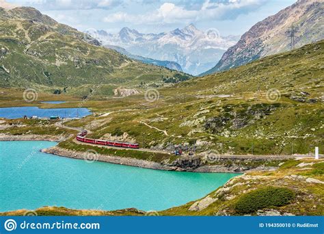 Bernina Express At The White Lake In Ospizio Bernina Engadin