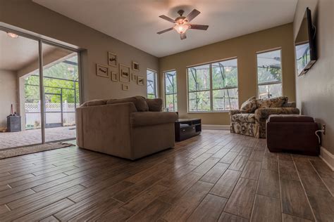 Ceramic flooring is a low maintenance solution for living rooms, dens, and family rooms. Wood-Look Tile - Ability Wood Flooring