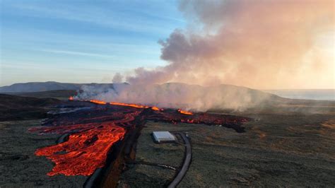 Iceland Volcano Buildings Burn As Lava From Eruption Flows Into