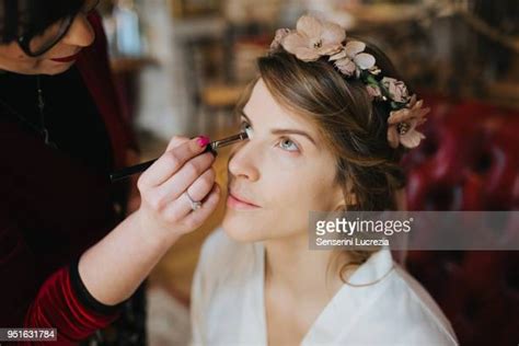 Bride Putting On Make Up Photos And Premium High Res Pictures Getty